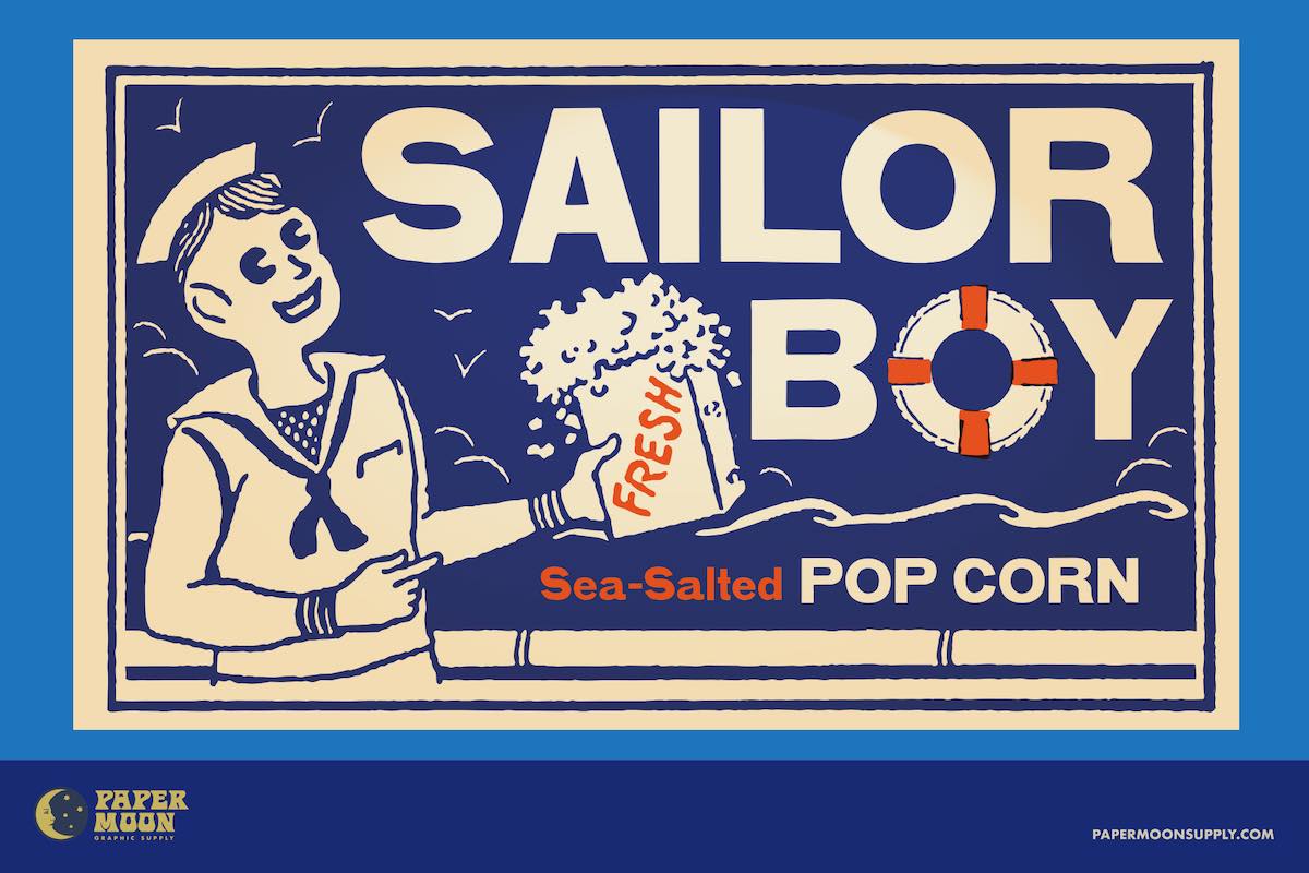 Norfolk Gothic a handmade wood letterpress font made from real prints. A promotional image showing a sailor holding a bag of popcorn. Text reads Sailor Boy Sea-Salted Pop Corn.